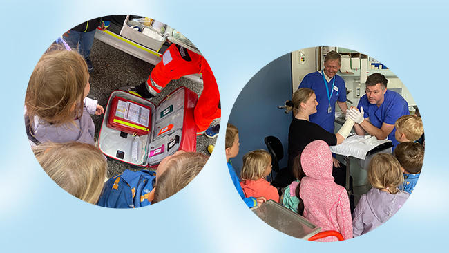 Die Kinder lernen auf der Rettungswache, was ein Notfallteam dabeihat, wenn was passiert.
